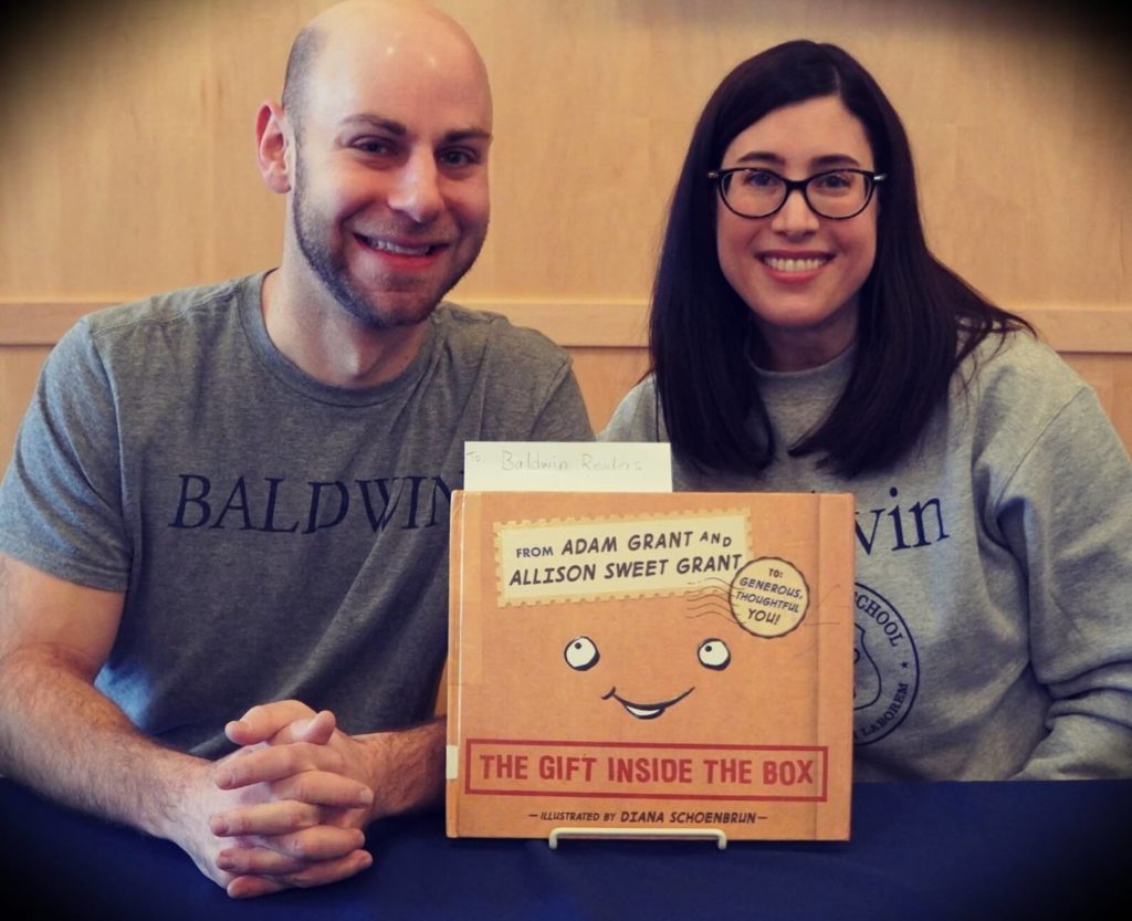Adam Grant with his wife Allison Sweet Grant taken during their book signing for "Leif and the Fall"
